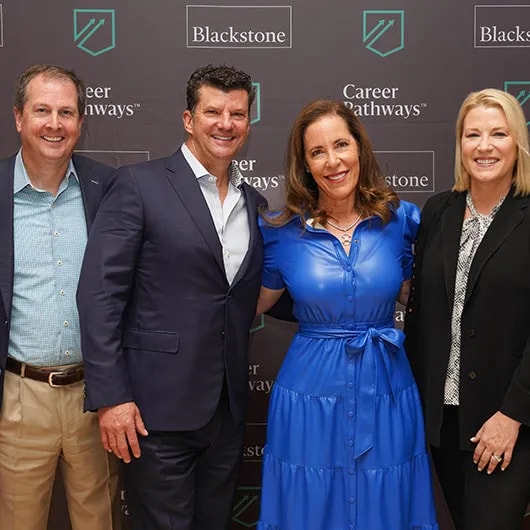 Pack Members attending a Blackstone event.